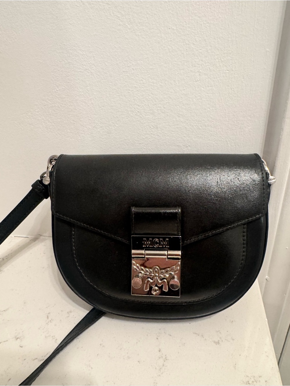 MCM Black Leather Crossbody Saddle Bag with Silver Lock